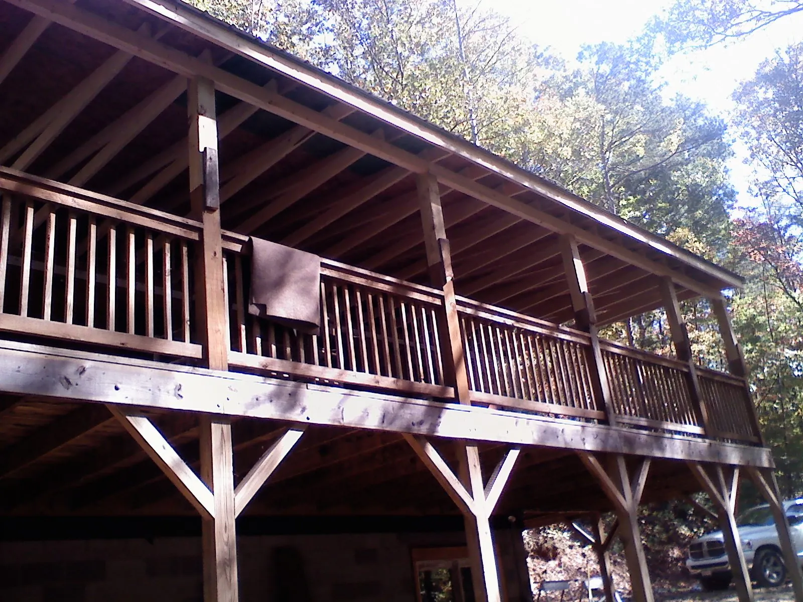 Timber framing under a new elevated porch and deck — Roof Leak Repair in Drexel by Roofing Brothers